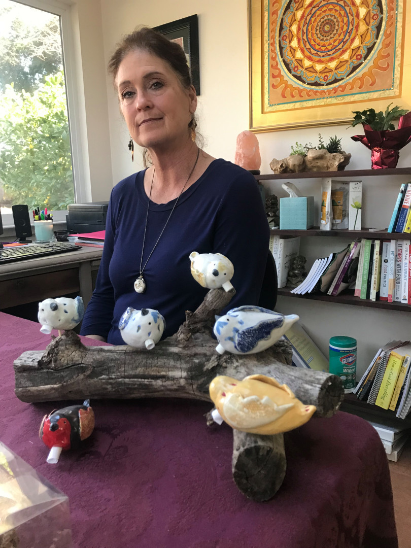 Local artist Janice Hofmann is making 86 ceramic birds, one for each life lost in the Camp Fire. Rolled up in the heart opening of each bird, she will place a victim's published Enterprise-Record obituary. (Robin Epley -- Enterprise-Record)